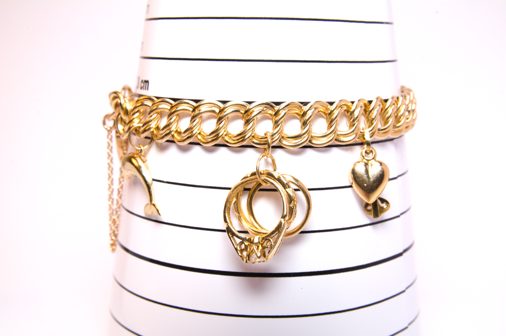 9ct Yellow Gold Charm Bracelet - loaded - 7¹/⁴ In - 26.81g