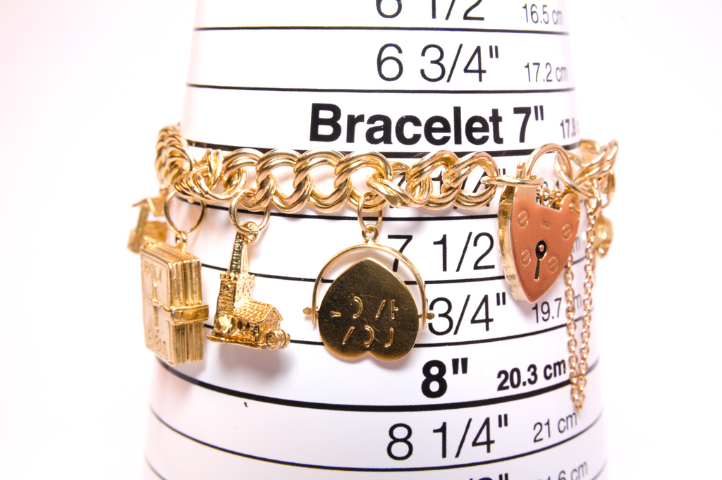 9ct Yellow Gold Charm Bracelet - loaded - 7¹/⁴ In - 26.81g
